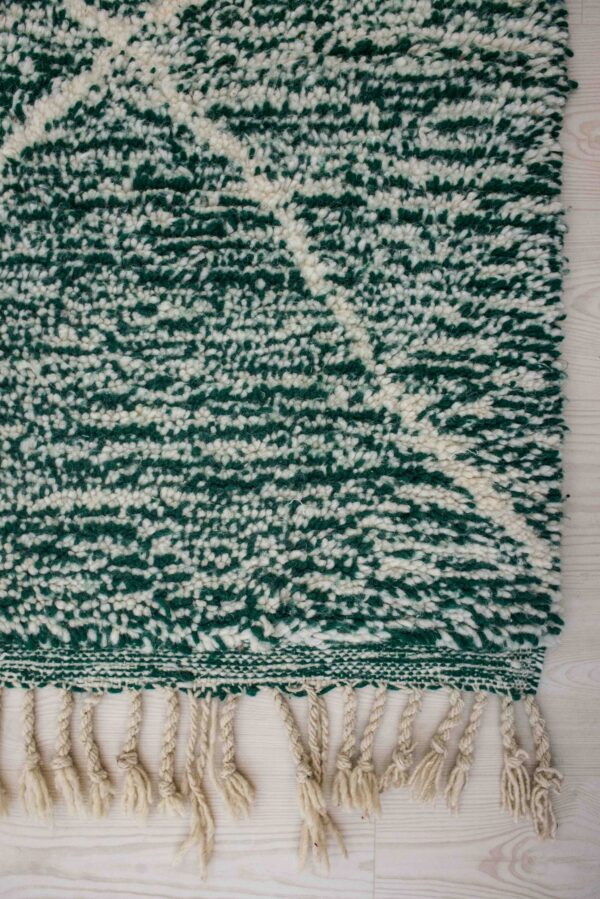 Handmade Green Wool Area Rug with Unique Design