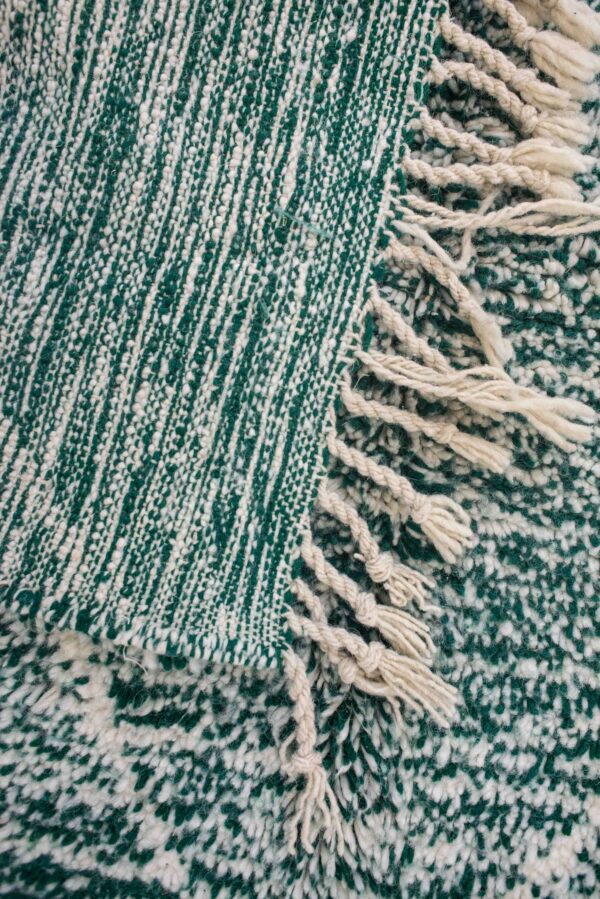 Handmade Green Wool Area Rug with Unique Design