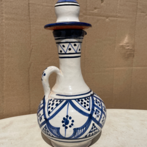 Handmade blue and white Moroccan ceramic jug with stopper and traditional artisan pottery design